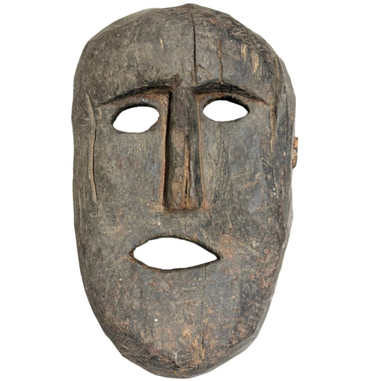 Authentiek antiek houten sjamanenmasker uit de Himalaya-regio, primitief handgesneden met diepe draagpatina